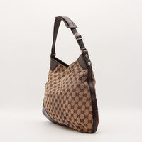 Profil gauche Hobo Horsebit Gucci canvas monogramme marron — AMANA Vintage