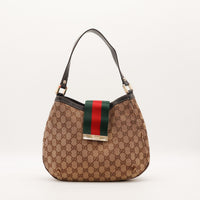 Hobo Web Gucci toile monogrammée bande Web verte rouge vue de face occasion — AMANA Vintage