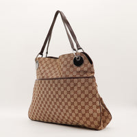 Tote Bag Gucci vue de trois quarts toile monogrammée cuir marron — AMANA Vintage