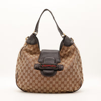 Hobo Gucci toile monogrammée beige marron fermoir Web vue de face occasion authentique — AMANA Vintage