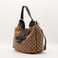 Hobo Gucci vue de trois quarts avec bandoulière amovible cuir marron foncé — AMANA Vintage