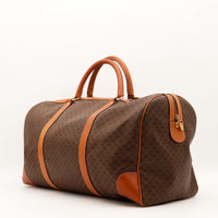 Vue latérale sac de voyage Céline Boston Macadam cuir cognac vintage — AMANA Vintage