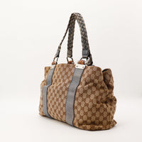 Sac Gucci Tote Bag Bamboo vue trois quarts toile monogramme gris beige occasion — AMANA Vintage