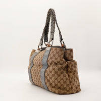 Sac Gucci Tote Bag Bamboo vue côté détail structure toile beige occasion — AMANA Vintage