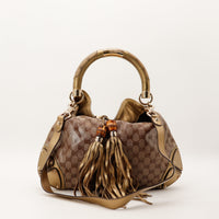 Sac Gucci Indy Hobo toile GG Crystal dore vue de face franges bambou occasion authentique — AMANA Vintage