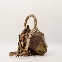 Gucci Indy Hobo grand modele vue trois quarts gauche cuir dore occasion — AMANA Vintage