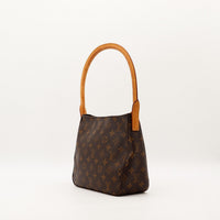 Vue de côté Louis Vuitton Looping MM profil silhouette structurée — AMANA Vintage