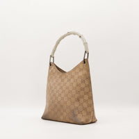 Hobo Bambou Gucci vue de profil droit daim monogrammé taupe — AMANA Vintage