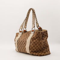Gucci Tote Bamboo vue trois quarts gauche anses tressees bambou occasion — AMANA Vintage