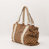 Gucci Tote Bamboo vue trois quarts droite detail cuir ivoire occasion — AMANA Vintage