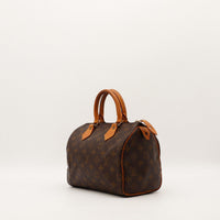Louis Vuitton Speedy 25 vue de trois quarts anses vachette patine caramel — AMANA Vintage