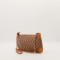Sac Gucci Hobo toile monogrammée vue de trois quarts dos bandoulière cuir camel — AMANA Vintage