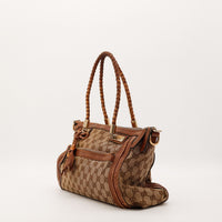Sac Gucci Tote Bag Bamboo vue de profil cuir marron occasion authentique — AMANA Vintage