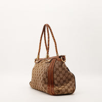 Sac Gucci Tote Bag Bamboo vue de côté anses tressées occasion authentique — AMANA Vintage