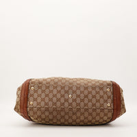 Fond du sac Gucci Hobo toile monogrammée et pieds dorés occasion authentique — AMANA Vintage