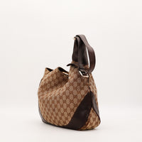 Sac Gucci Hobo GG cuir et toile vue de profil occasion authentique — AMANA Vintage