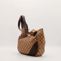 Sac Gucci Hobo GG silhouette souple vue laterale occasion authentique — AMANA Vintage