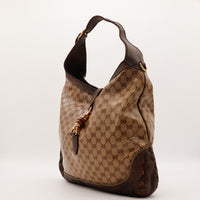 Sac Gucci New Jackie cuir marron vue de trois quarts occasion authentique — AMANA Vintage
