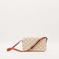 Profil gauche Celine Triomphe toile Triomphe ivoire bandoulière cuir marron — AMANA Vintage