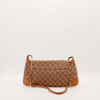 Sac Gucci Hobo toile monogrammée vue de dos chaîne dorée cuir cognac occasion — AMANA Vintage