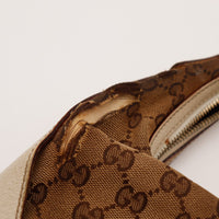 Detail toile effilochée fixation anse Gucci Hobo Bamboo occasion authentique — AMANA Vintage
