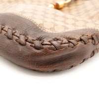 Détail coin et tressage cuir Gucci New Jackie occasion authentique — AMANA Vintage