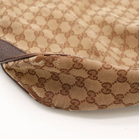 Détail base toile monogrammée Gucci Hobo GG occasion authentique — AMANA Vintage