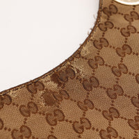 Détail usure de la toile Gucci Hobo GG occasion authentique — AMANA Vintage