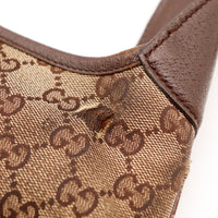 Détail toile et anse Gucci Jackie occasion authentique — AMANA Vintage