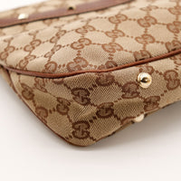 Détail coin et bordure cuir Gucci Hobo Bamboo occasion authentique — AMANA Vintage