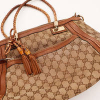 Détail pampilles bambou Gucci Tote Bag Bamboo occasion authentique — AMANA Vintage