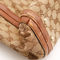 Détail toile trouée au coin Gucci Tote Bag Bamboo occasion authentique — AMANA Vintage