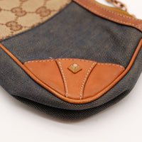 Détail coin cuir et toile denim Gucci pochette occasion authentique — AMANA Vintage