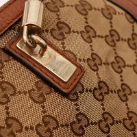 Détail plaque Gucci made in Italy occasion authentique — AMANA Vintage