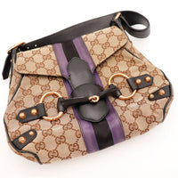 Détail fermoir Horsebit Gucci doré rose sac occasion authentique — AMANA Vintage