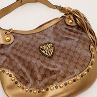 Détail fermeture éclair et gland doré Hobo Gucci Babouska — AMANA Vintage