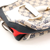 Détail coin inférieur Hobo Gucci Horsebit frottements canvas — AMANA Vintage