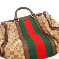 Détail défaut coin inférieur cuir usé Gucci Joy Boston Web — AMANA Vintage