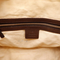 Détail coin inférieur frottements cuir marron Gucci Joy Boston Web — AMANA Vintage