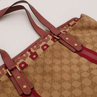 Détail canvas monogramme et bandes bordeaux Tote Bag Gucci — AMANA Vintage