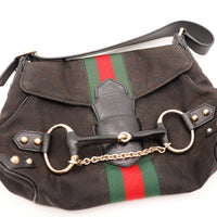 Détail mors de cheval doré fermoir Gucci Horsebit Web noir — AMANA Vintage