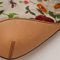 Detail coin bas Gucci Jackie Flora taches d'humidite sur le cuir de base — AMANA Vintage