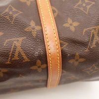 Détail anse cuir vachette patine caramel Louis Vuitton Papillon 30 — AMANA Vintage