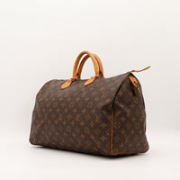 Louis Vuitton Speedy 35 vue de trois quarts toile Monogram cuir vachette caramel — AMANA Vintage