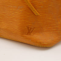 Detail coin inferieur Louis Vuitton Noe Epi jaune — AMANA Vintage