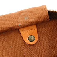 Détail anses vachette caramel et attaches Louis Vuitton Speedy 35 — AMANA Vintage