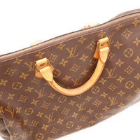 Détail languette cadenas vachette Louis Vuitton Speedy 35 — AMANA Vintage