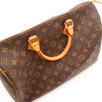 Vue anse cuir vachette patine caramel Louis Vuitton Speedy 35 — AMANA Vintage