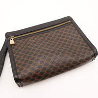 Détail fermeture éclair dorée pochette Céline Macadam occasion authentique — AMANA Vintage