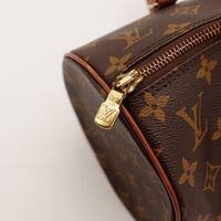 Détail fermeture éclair dorée Louis Vuitton Papillon 30 — AMANA Vintage